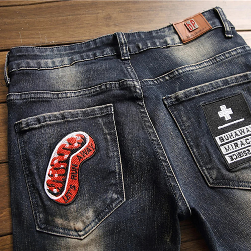 Original Design New European American Trend Men's Jeans Male Torn Sticking Cloth Stretch Small Straight Leg Fashion Denim Pants